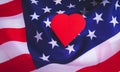 Love for America. Heart on the background of the USA flag. Royalty Free Stock Photo