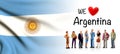 We love Argentina, A group of people pose next to the Argentine flag Royalty Free Stock Photo
