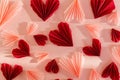 Love background. Happy Valentine`s day. Stylish pink and red hearts composition on pink paper background. Creative modern