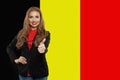 Love Belgium concept. Happy girl with belgian flag Royalty Free Stock Photo