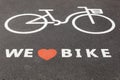 We love bike symbol on a road Royalty Free Stock Photo