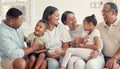 Love, black family and happy together, with smile and bonding for quality time, loving and on sofa. Grandparents, mother