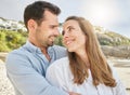 Love, bond and couple hug on the beach, relax and enjoy romantic quality time together, peace or freedom. Marriage Royalty Free Stock Photo