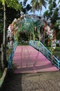 Love bridge decorated with flowers.