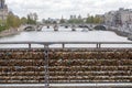 Love bridge full of lockers in paris on sunny day