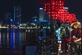 Love Bridge and its visitors at night, Da Nang