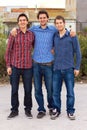 Love between brothers. Portrait of a group of young men standing outdoors. Royalty Free Stock Photo