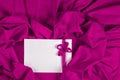 Love card with heart and ribbon on a purple fabric Royalty Free Stock Photo