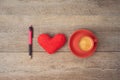 Love for coffee concept. Coffee cup, heart shape and pen on wooden background Royalty Free Stock Photo