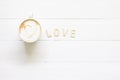 Love coffee cup of latte art with heartin white cup, romantic for valentine's Day  on wood background Royalty Free Stock Photo