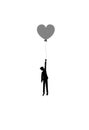 In love concept, boy silhouette holds the heart shaped balloon, dreamer concept, shadow story