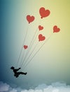 In love concept, girl silhouette holds the red heart shaped balloons and flying up to the sky, dreamer concept, shadow