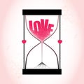 Love concept with hourglass and decreasing sand on the textured pink background Royalty Free Stock Photo