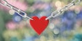 Love concept. Locked red heart padlock on metal chain against bokeh background. 3d illustration Royalty Free Stock Photo