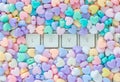 Love concept, LOVE text keyboard with colorful pastel heart shaped beads border. Royalty Free Stock Photo