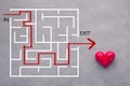 Love concept maze drawing with red heart