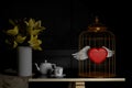 Love and concept . red heart in bird cage .Valentines day.3d rendering. 3d illustration.minimal style