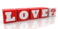 LOVE concept on red toy blocks with a question mark at the end Royalty Free Stock Photo