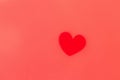 Love concept. Stylish valentine heart in red light on soft red background, flat lay with space for text. Happy Valentines Day