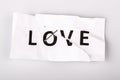 love concept on torn and stapled paper Royalty Free Stock Photo