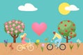 Love couple concept of valentine day, two enamored on bicyle near tree with flowers and fruits and pink heart baloon in