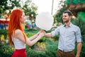 Love couple with cotton candy in summer park Royalty Free Stock Photo