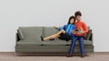 Love couple man and woman laying vdo game on couch together, romantic valentine day, 3D rendering character