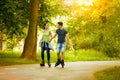 Love couple ride rollerblades Royalty Free Stock Photo
