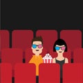 Love couple sitting in movie theater eating popcorn. Film show Cinema background. Viewers watching movie in 3D glasses. Red seats Royalty Free Stock Photo