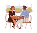 Love couple talking on date in cafe. Biracial man and woman sitting at table in romantic evening, rendezvous. Lovers