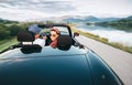 In love couple traveling by cabriolet car Royalty Free Stock Photo