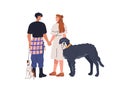 Love couple with two dogs. Happy man and woman, pet owners walking with doggies together. Romantic people, family and