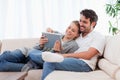 In love couple using a tablet computer Royalty Free Stock Photo