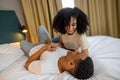 Cute young couple feeling romantic in a hotel room