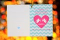 Love day frame Valentine greetings on bokeh background. Holiday frame text love greetings, colorful lights in the frame of hearts