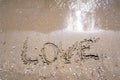 Love drawn on the sand of a beach Royalty Free Stock Photo