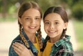 love each other. Two young smiling hipster girls in trendy summer clothes. carefree kids posing outdoor. Positive models Royalty Free Stock Photo