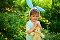 Love easter. Family holiday. Egg hunt on spring holiday. Happy easter. Childhood. Little boy child in green forest Royalty Free Stock Photo