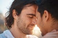 Love, embrace and gay couple, men at sunset with hug and smile on summer vacation together in Thailand. Sunshine, nature Royalty Free Stock Photo