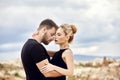 Love and emotions loving couple resting in Turkey. In love Eastern couple in the mountains of Cappadocia hugs and kisses. Close-up