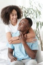 Love emotions, romantic young couple have fun on bed at spare time or weekend during covid-19 Royalty Free Stock Photo