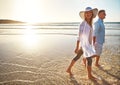 We love everything about the beach. a mature couple spending the day at the beach.