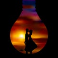 Love expression, couple hugging in light bulb shape. Royalty Free Stock Photo