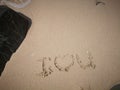 I love you a message on the sandy beach for lovely couple Royalty Free Stock Photo