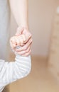 Love and family concept. Hands of mother with baby closeup Royalty Free Stock Photo