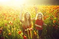 Love and family, happy mother and child in poppy field Royalty Free Stock Photo