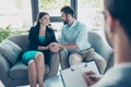 Love, family, psychology and happiness concept - young couple hugging at psychologist office, they are so happy, they cured from Royalty Free Stock Photo