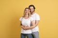 Love, family relationship and romance. Smiling young caucasian male hugging woman in white t-shirts Royalty Free Stock Photo