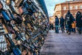 Love and fidelity. Padlocks on a suspension pedestrian bridge in Krakow, Poland Royalty Free Stock Photo