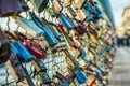 Love and fidelity. Padlocks on a suspension pedestrian bridge in Krakow, Poland Royalty Free Stock Photo